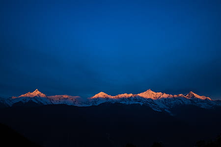 landscape photography of mountain with snowfield thumbnail