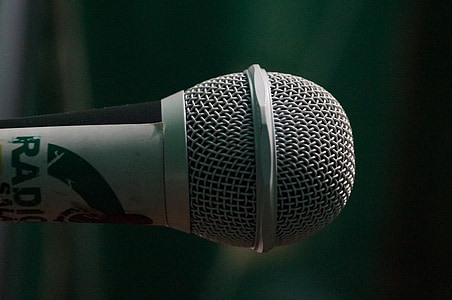 focus photography of white microphone thumbnail