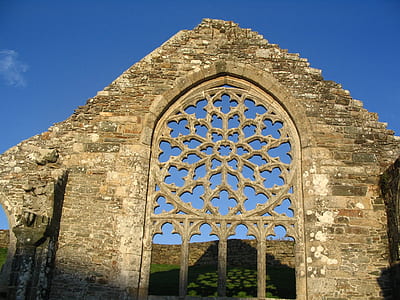 filigree wall artwork on ruins thumbnail