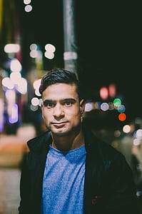 Photography of a Man Wearing Black Jacket thumbnail