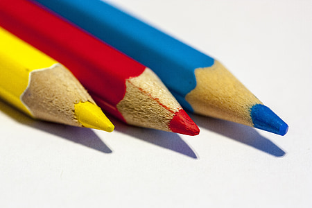 three assorted-color color pencils thumbnail