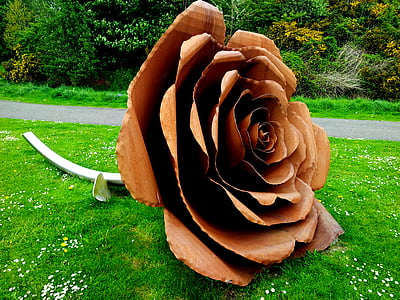 brown flower statue on garden thumbnail