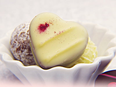 several macarons in white bowl thumbnail