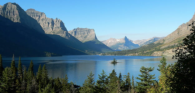 body of water near mountains thumbnail