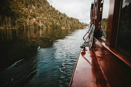 Red Boat On Body Of Water thumbnail