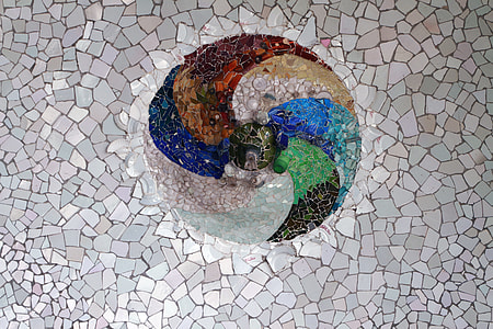 red, blue, and biege tiled wall decor thumbnail