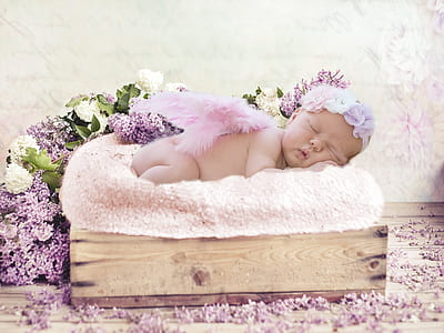 sleeping baby on top of white pad thumbnail