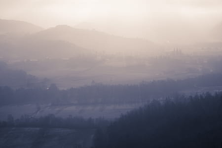aerial photography of mountain range under golden hour thumbnail