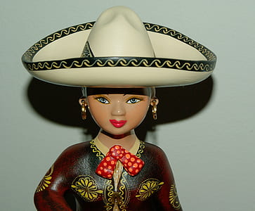 woman in red and white floral dress ceramic figurine thumbnail