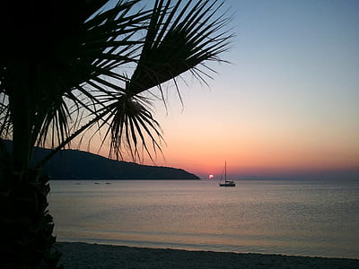 boat in middle of ocean thumbnail
