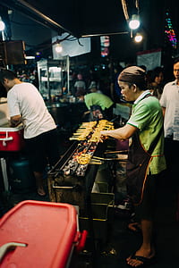 man grilling street foods thumbnail
