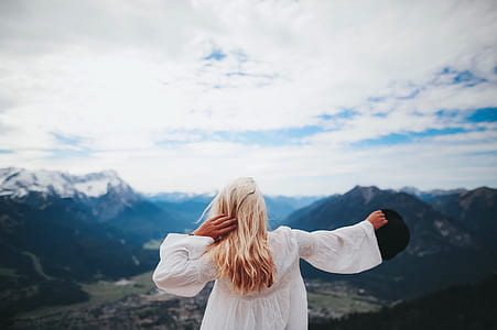 White Dressed Girl Across Black Mountains thumbnail