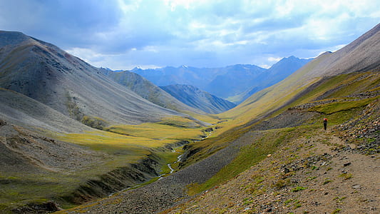 person standing on mountain thumbnail