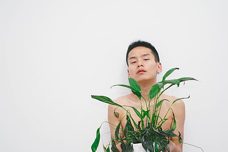 plant covering man's body thumbnail