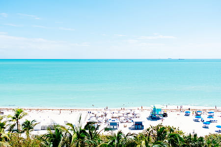 aerial view photography of ocean and shore thumbnail