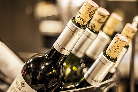 white labeled bottles with corks thumbnail