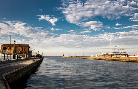 concrete dock during daytime thumbnail