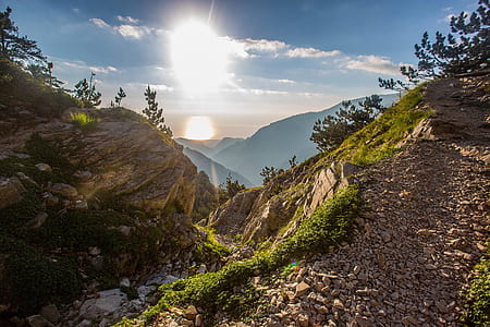 photo of mountains during daytime thumbnail