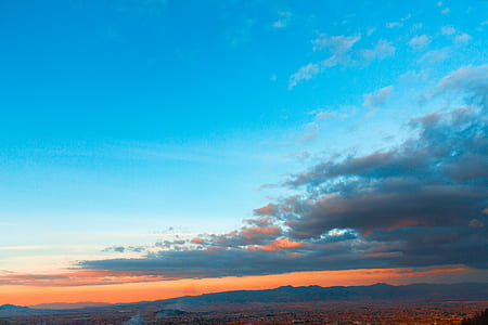 dark clouds under blue sky thumbnail