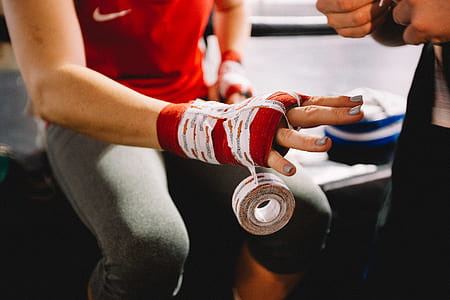person with red bandage on right hand thumbnail