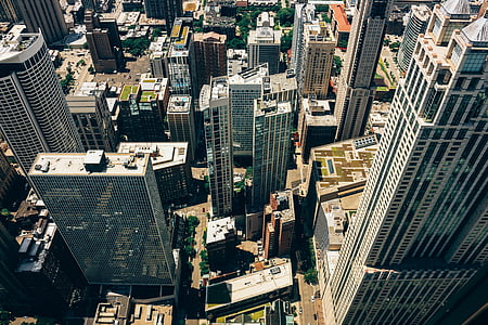 aerial photo of gray concrete city buildings during daytime thumbnail