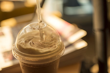 selective focus photography of filled shake tumbler with straw thumbnail