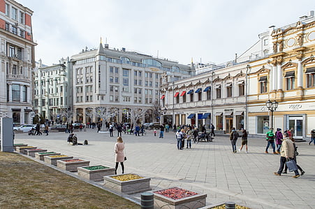 group of people near buildings during daytime thumbnail