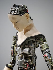 selective focus photography of gray and beige robot thumbnail