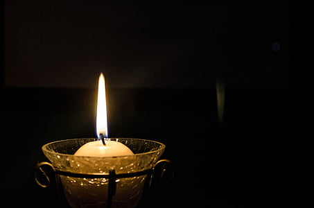 votive candle on clear glass holder thumbnail