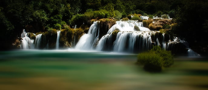 timelapse photography of waterfalls thumbnail