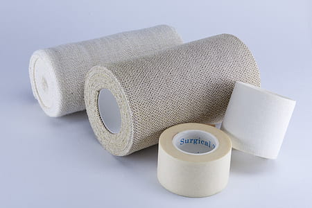 two gray gauges beside adhesive tapes thumbnail
