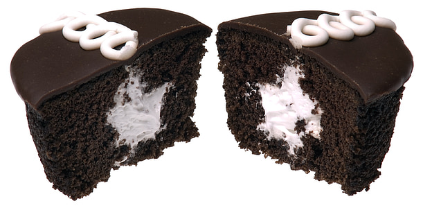 slice of chocolate cake with white cream thumbnail
