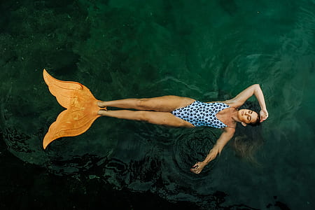 woman floating on water thumbnail