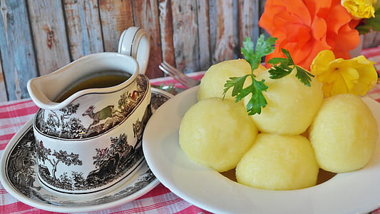 white and black ceramic rasgulla thumbnail