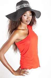woman wearing red one-shoulder sleeveless top and black and white sunhat thumbnail