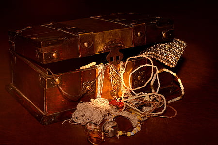 gray and black trunk case with jewelries thumbnail