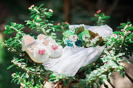 pair of girl's white flats thumbnail