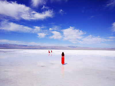 woman standing on open field thumbnail