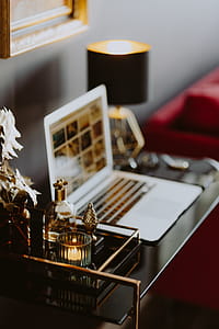 Elegant home office with golden accessories thumbnail