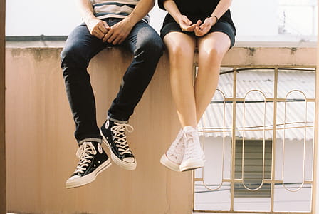 Woman Wearing White High-top Shoes thumbnail