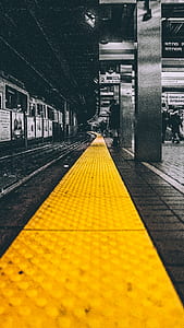 selective photography of yellow hallway thumbnail