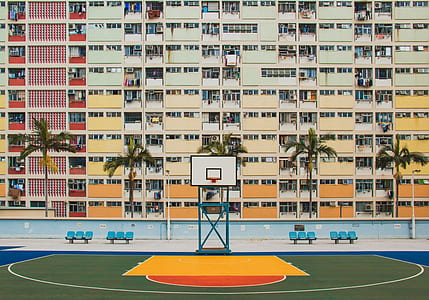 white and blue portable basketball hoop and building illustration thumbnail