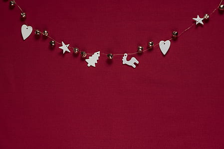 white and gray hanging decors near wall thumbnail