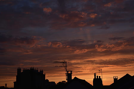 silhouette of building during golden hour thumbnail