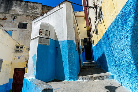 blue and white concrete wall along pathway thumbnail