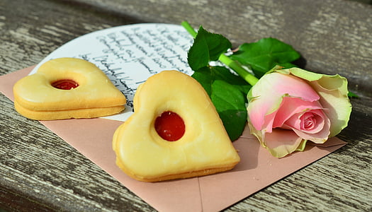 heart cookies near pink tulip rose thumbnail