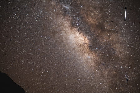 milky way photography of cliff thumbnail