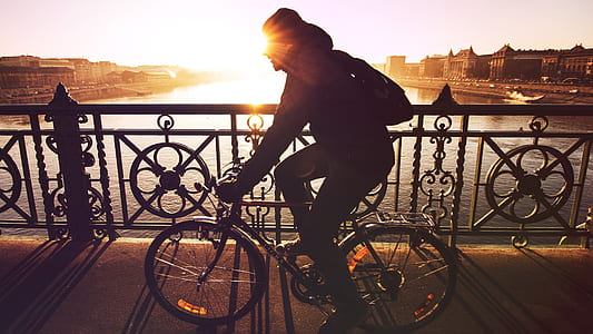 silhouette photo of person riding on bicycle thumbnail