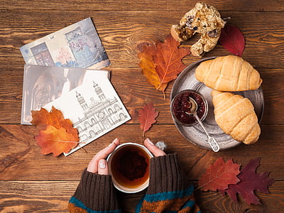 flat lay photography of three pictures, leaf, and bread on table thumbnail