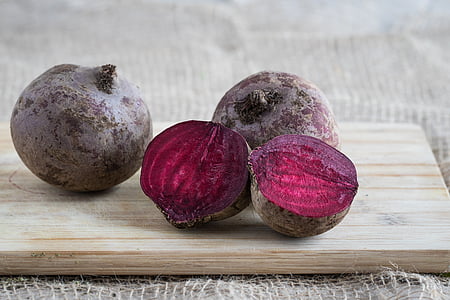 red beets on brown chopping board thumbnail